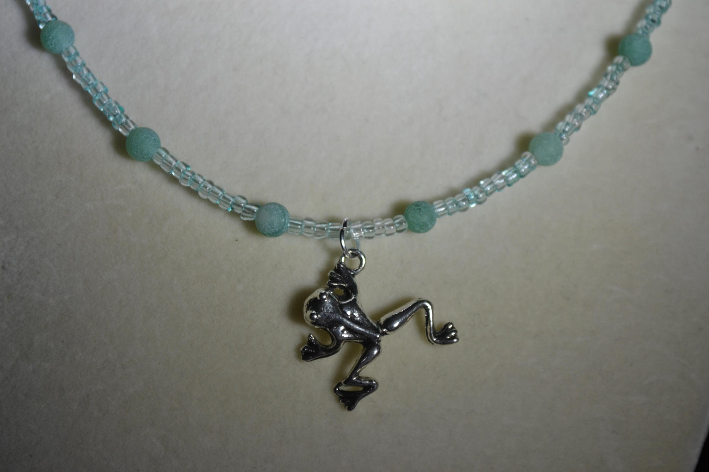 Frog pendant glass bead necklace. Blue and greens