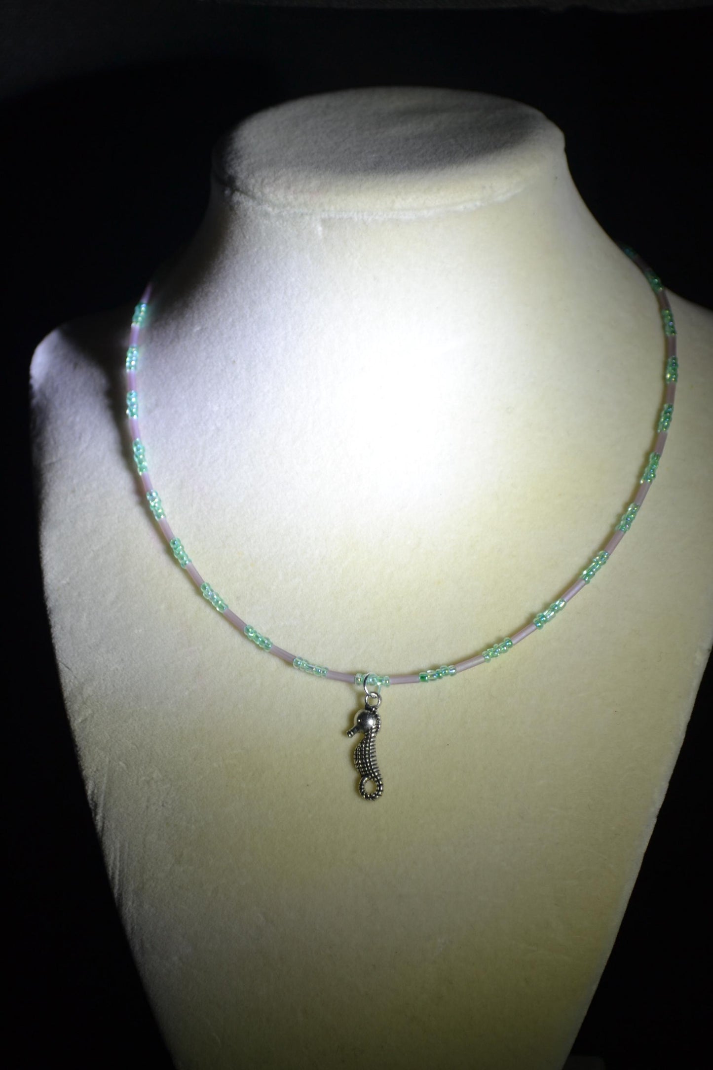 Seahorse pendant glass bead necklace. Blue and amethyst