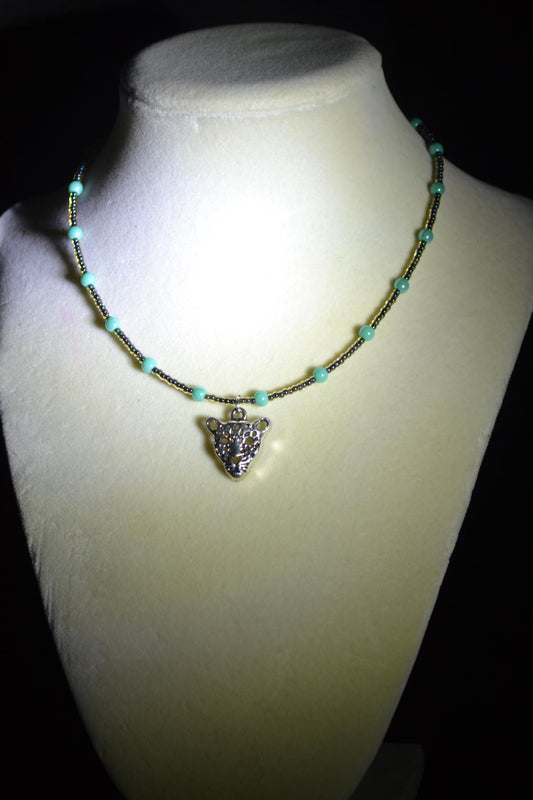 Jaguar pendant glass bead necklace. Teal and black