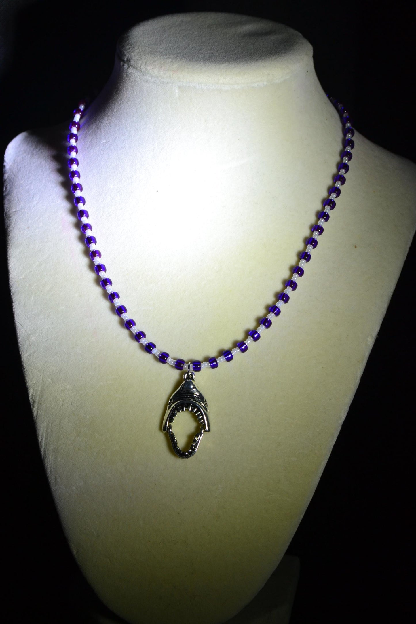 Shark Jaws pendant glass bead necklace. Blue and pearl