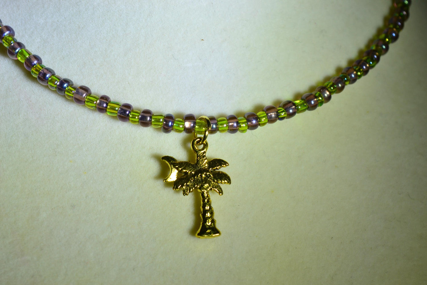 Palm Tree pendant glass bead choker. Amethyst and green