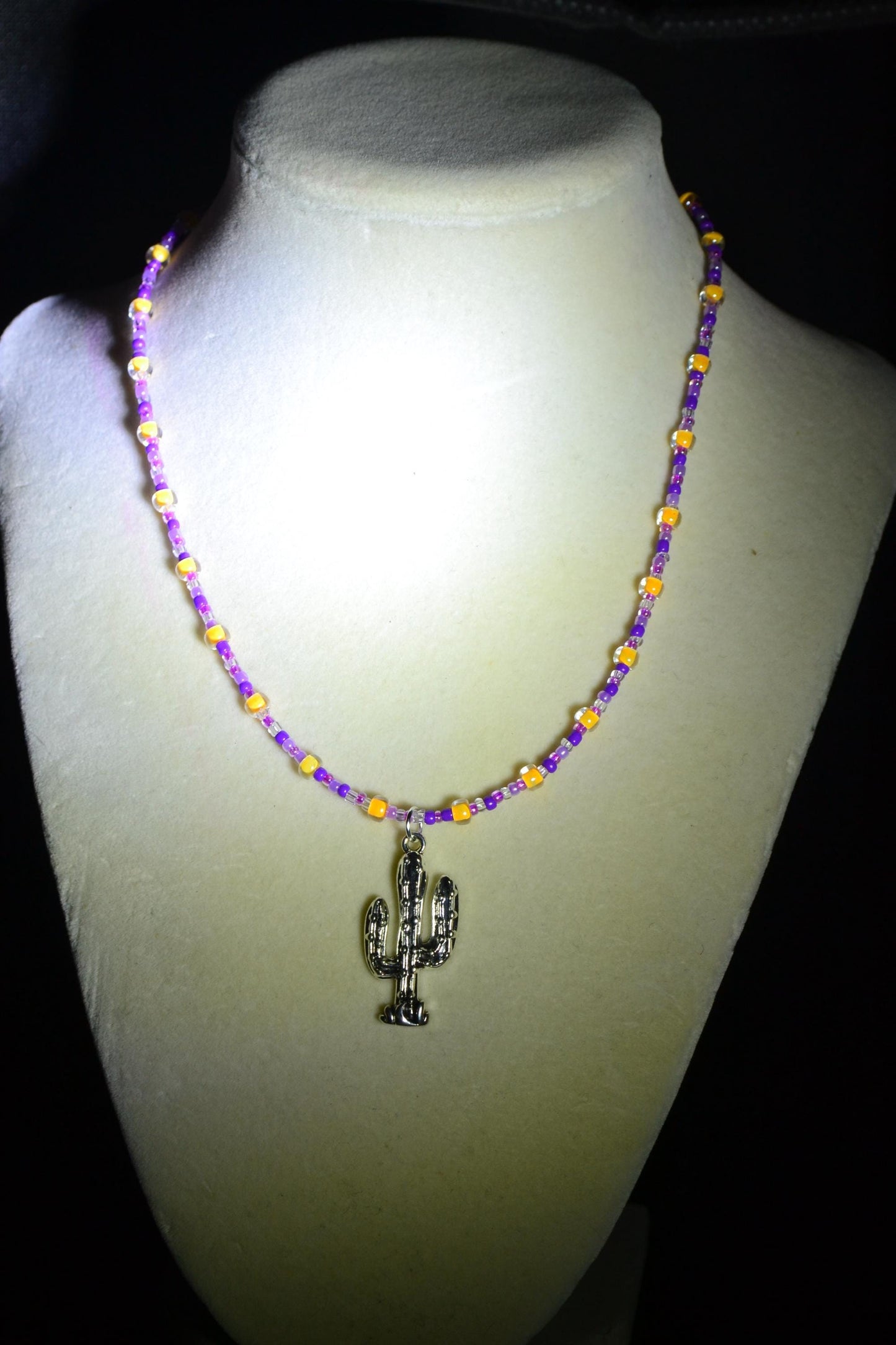 Cactus pendant glass bead necklace. Purples and tangerine