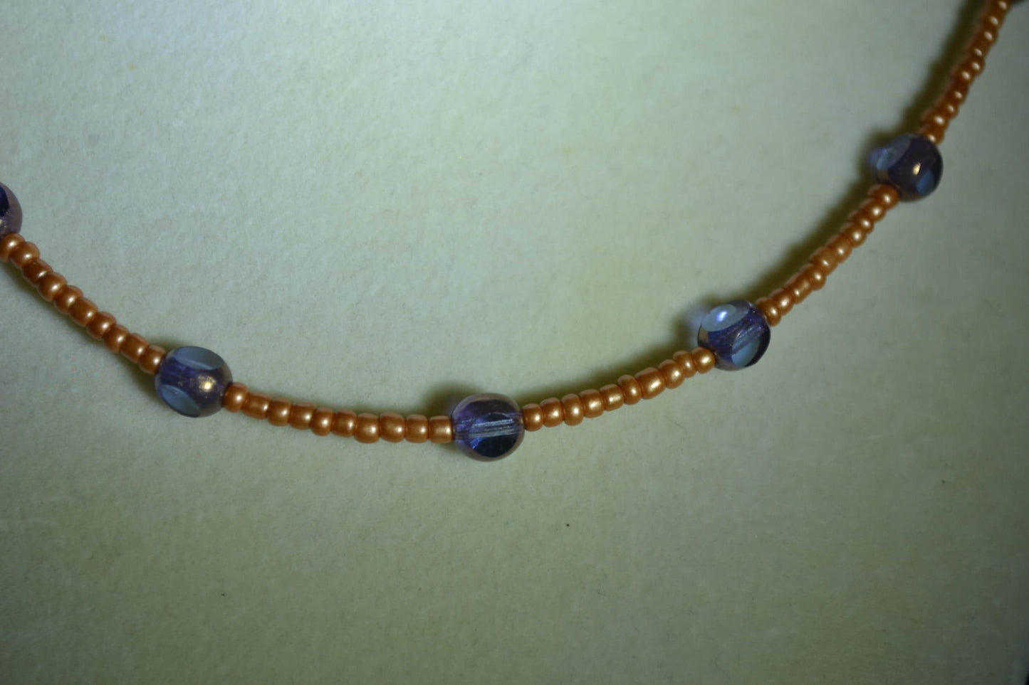 Multicolor glass bead necklace. Burnt orange and amethyst