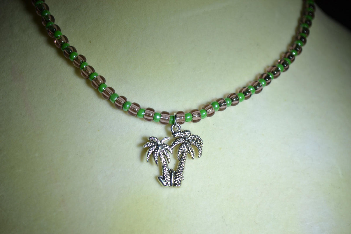 Silver Palms pendant glass bead choker. Amethyst and green