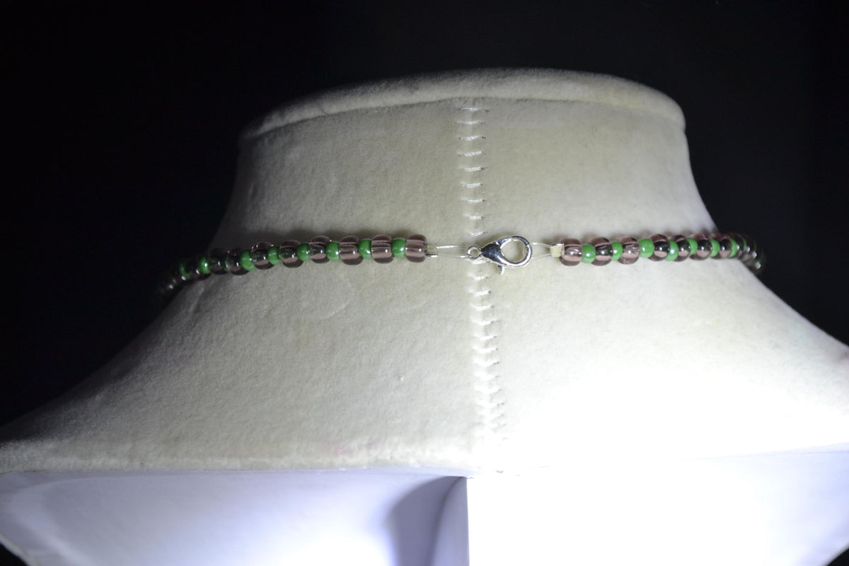 Silver Palms pendant glass bead choker. Amethyst and green