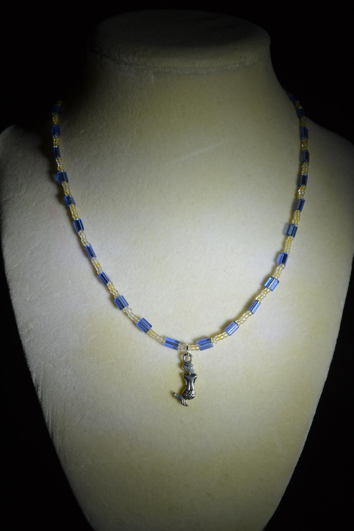 Silver Mermaid pendant glass bead necklace. Blue and sand