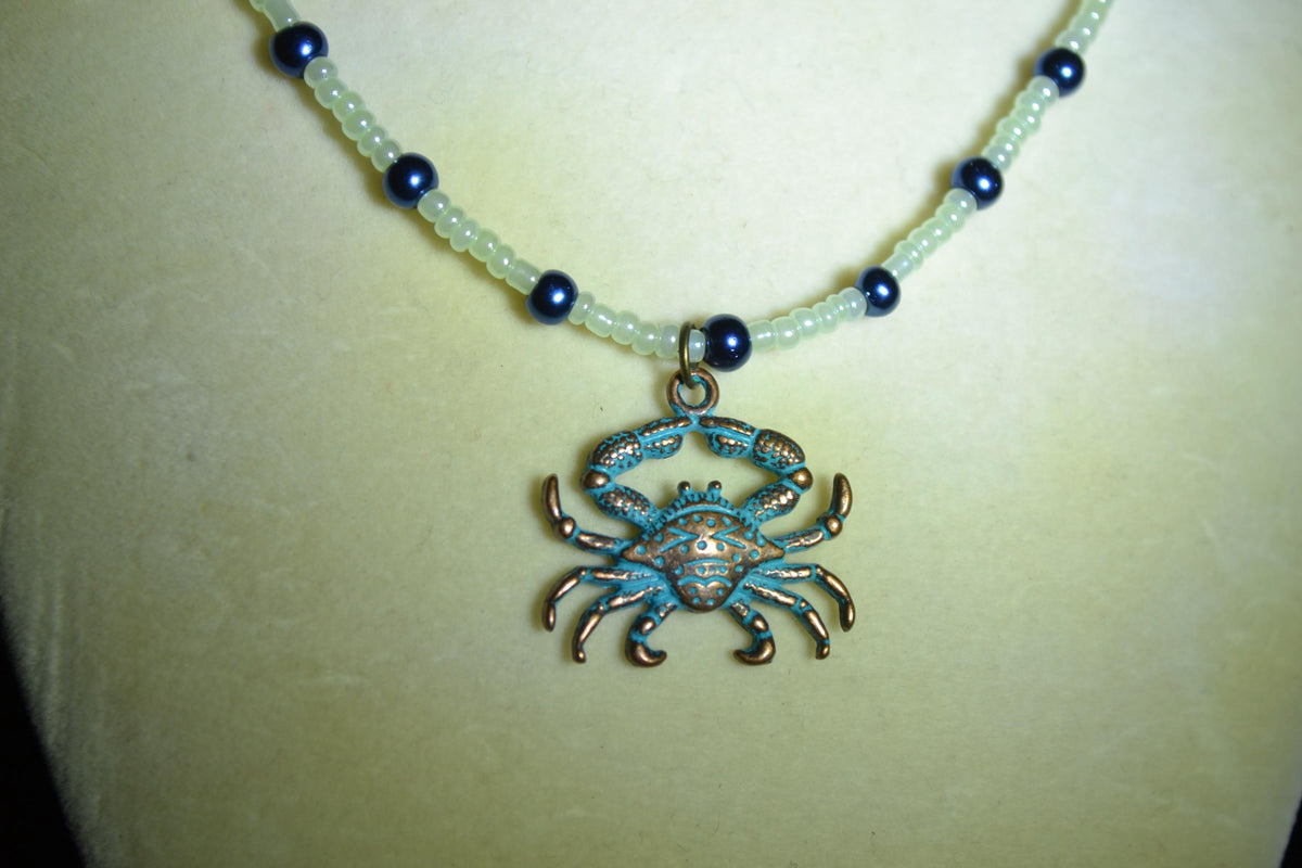 Bronze& Blue Crab pendant glass bead necklace. Pearl green and navy