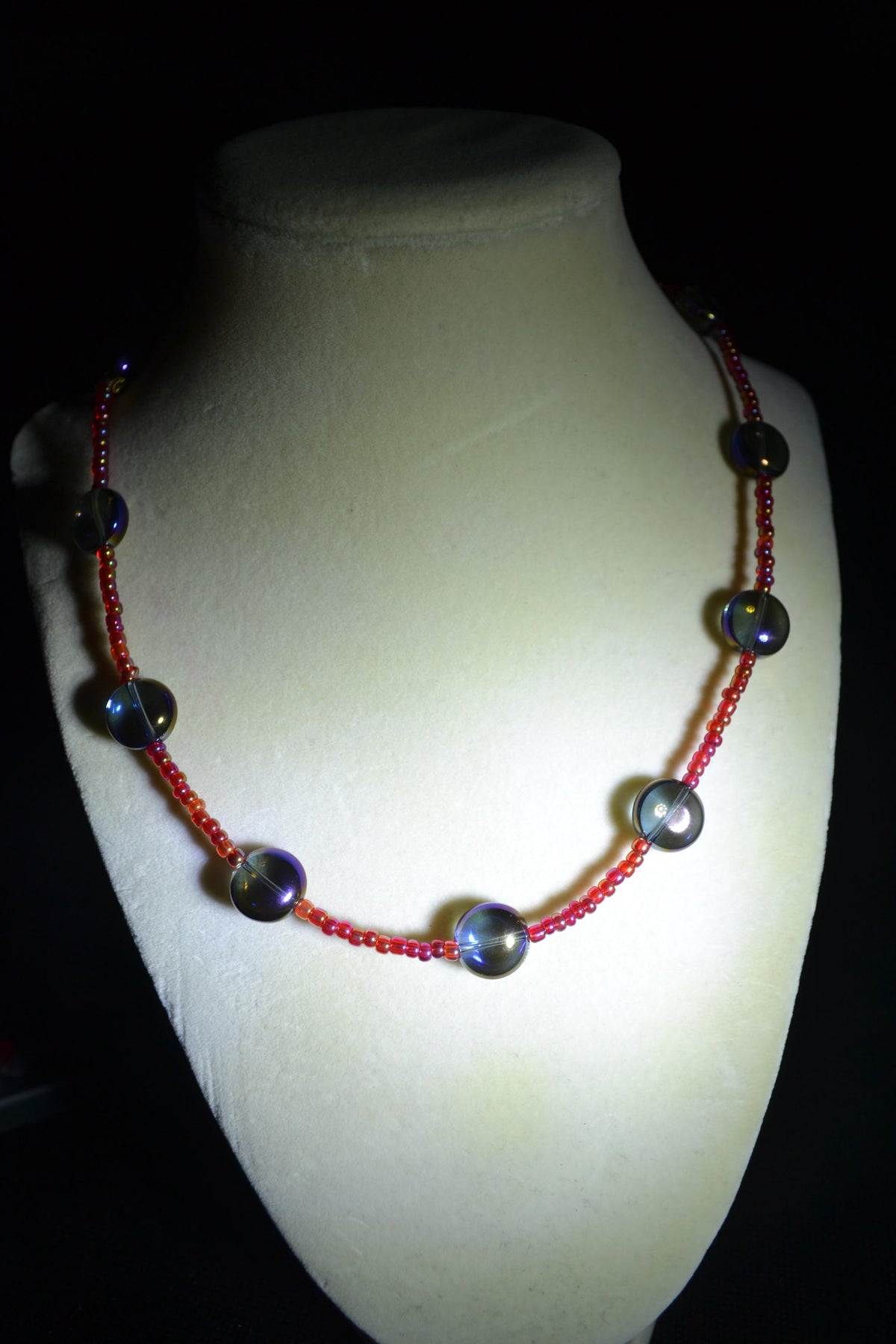 Multicolor glass bead necklace. Iridescent blue and raspberry