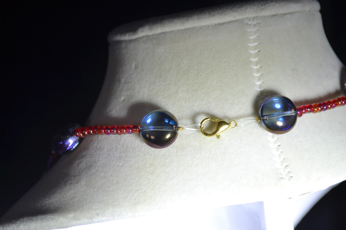 Multicolor glass bead necklace. Iridescent blue and raspberry