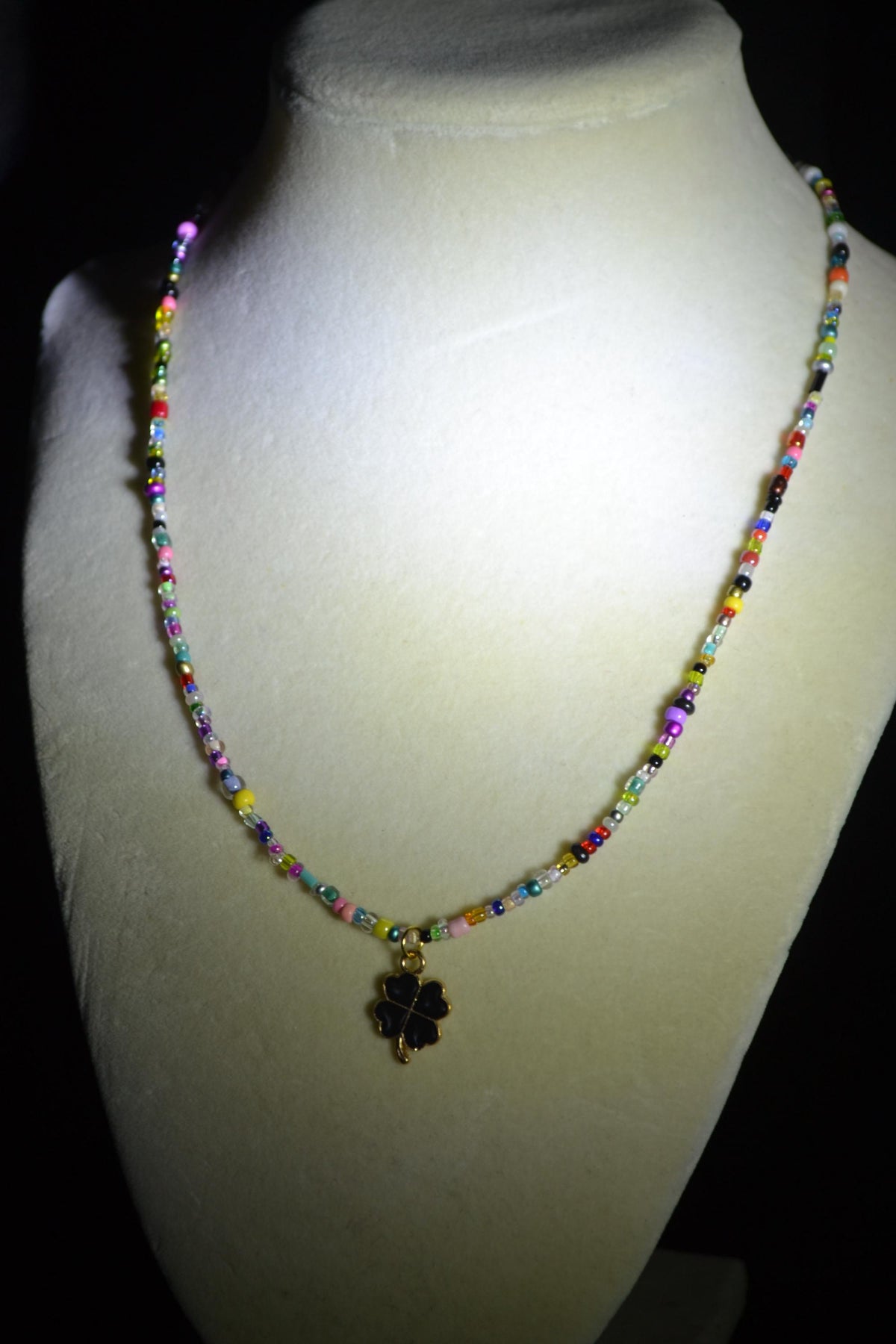 Black clover pendant glass bead necklace. Rainbow