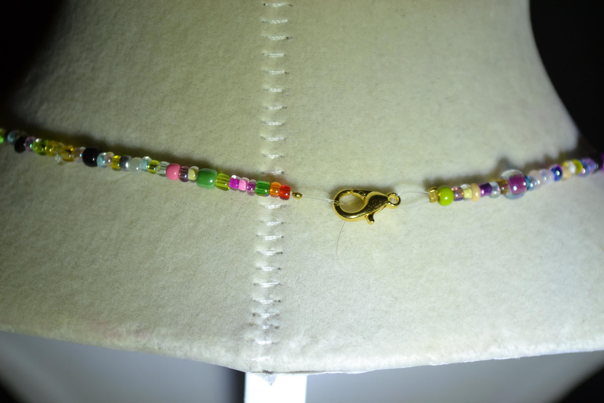White star pendant glass bead necklace. Rainbow
