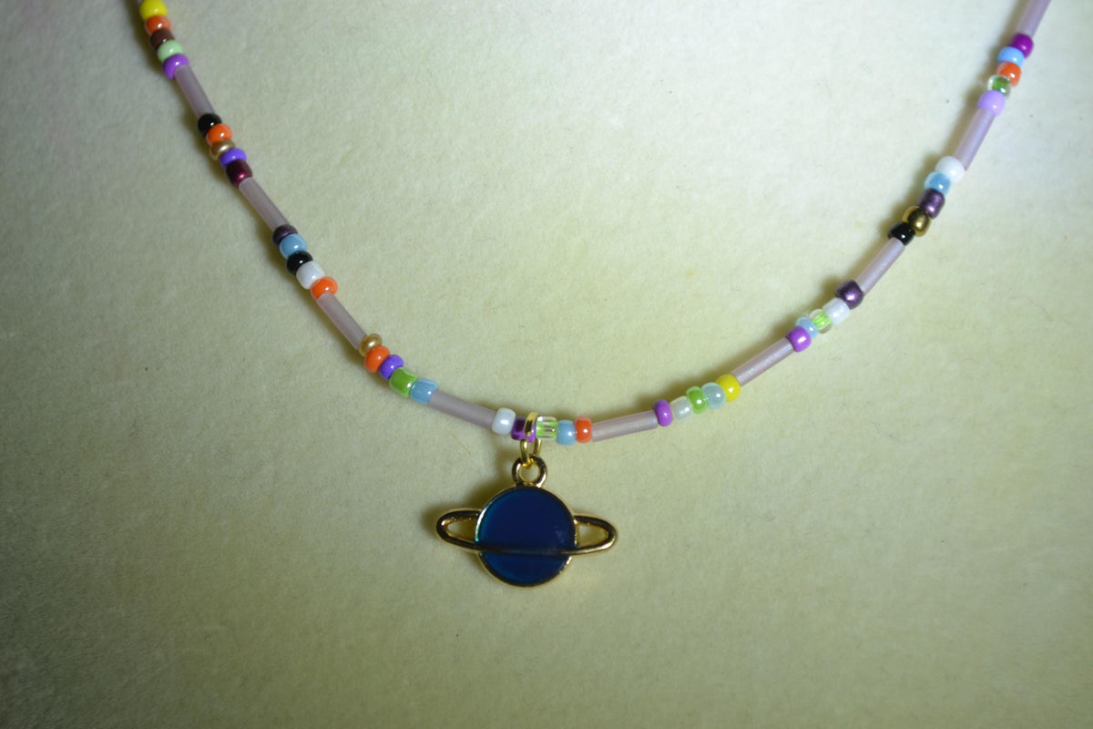 Blue planet pendant glass bead choker. Rainbow