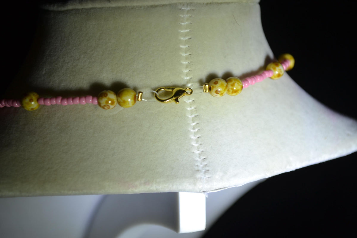 Wire wrapped sharks tooth beaded choker. Pink and Picasso