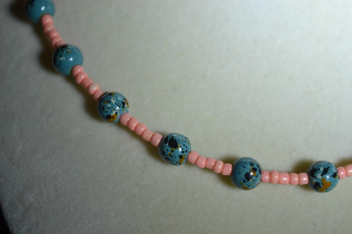 Multicolor glass bead necklace . Coral and turquoise