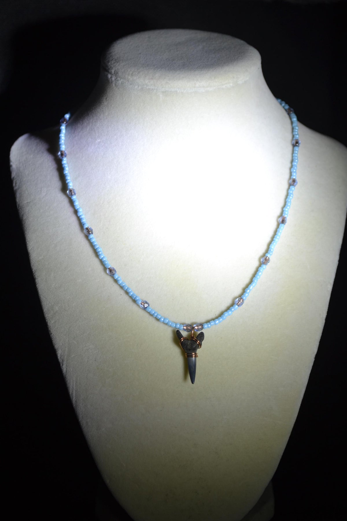 Wire wrapped sharks tooth beaded necklace. Silver and blue