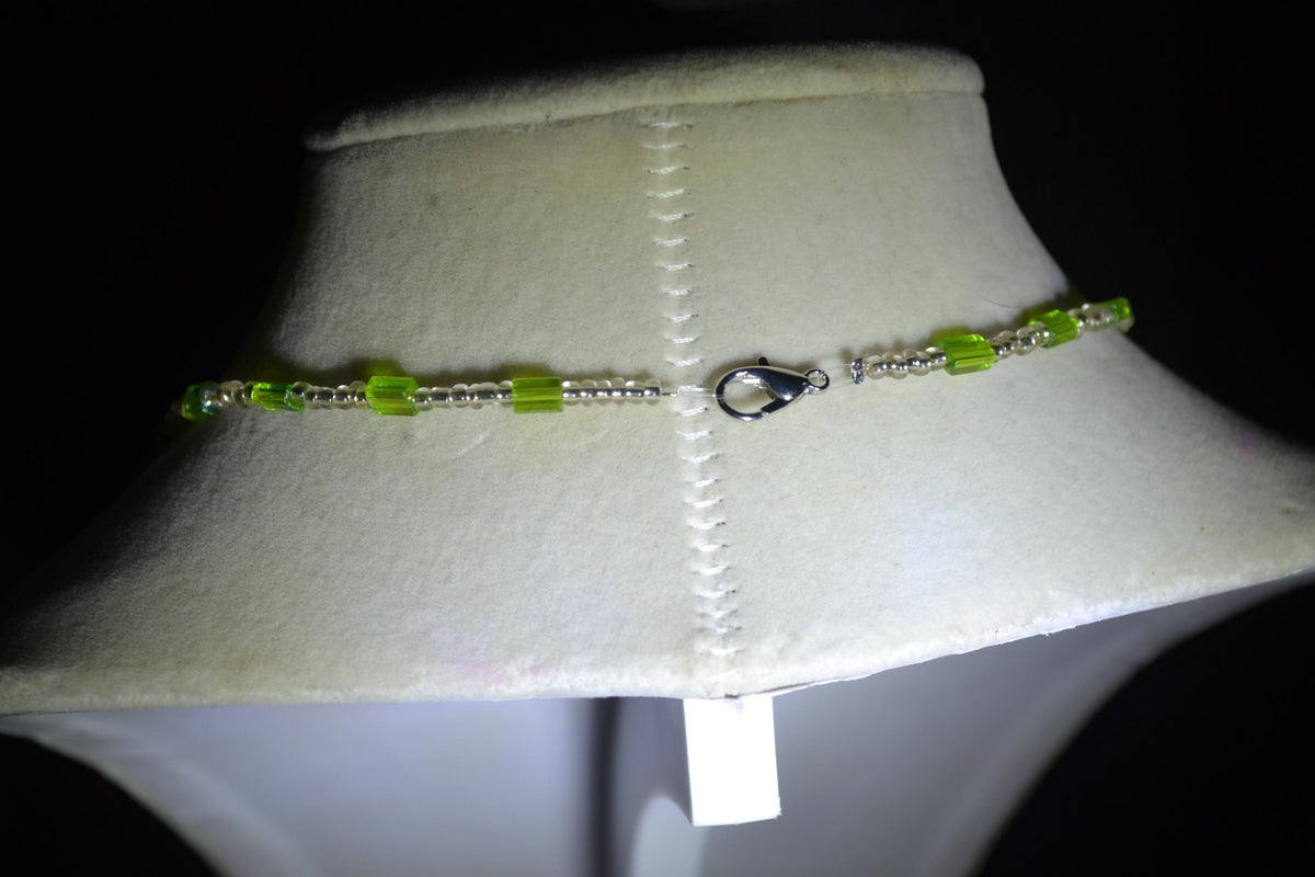 Wooden Monstera pendant glass bead necklace. Green and silver