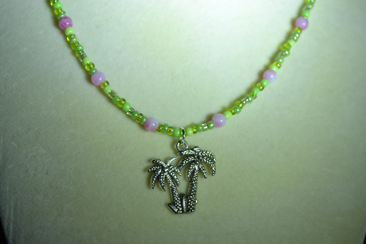 Silver Palms pendant glass bead necklace. Marbled Pink and greens