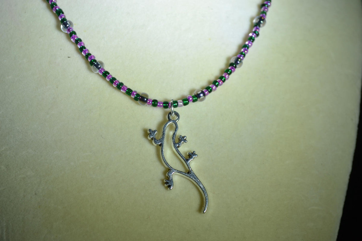 Silver gecko pendant glass bead necklace. Pine green & hot pink