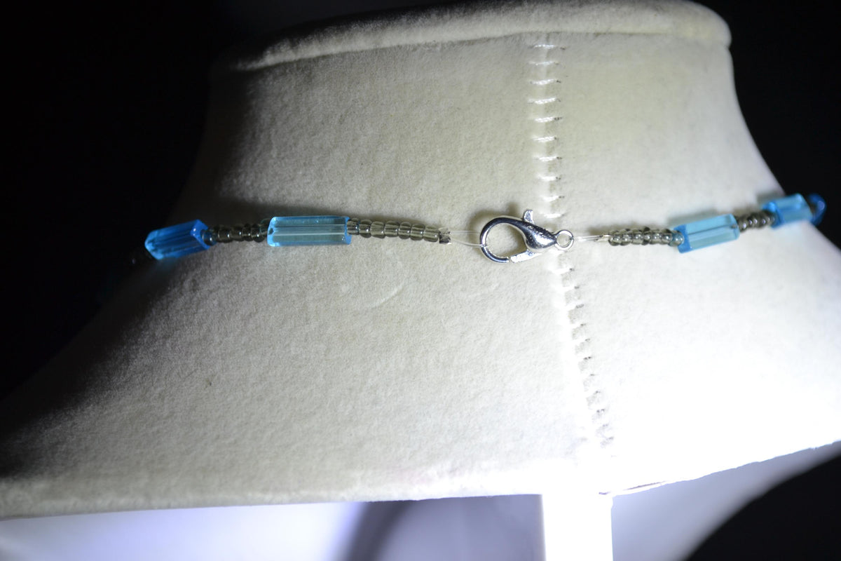 Silver crab pendant glass bead necklace. Blue and gray