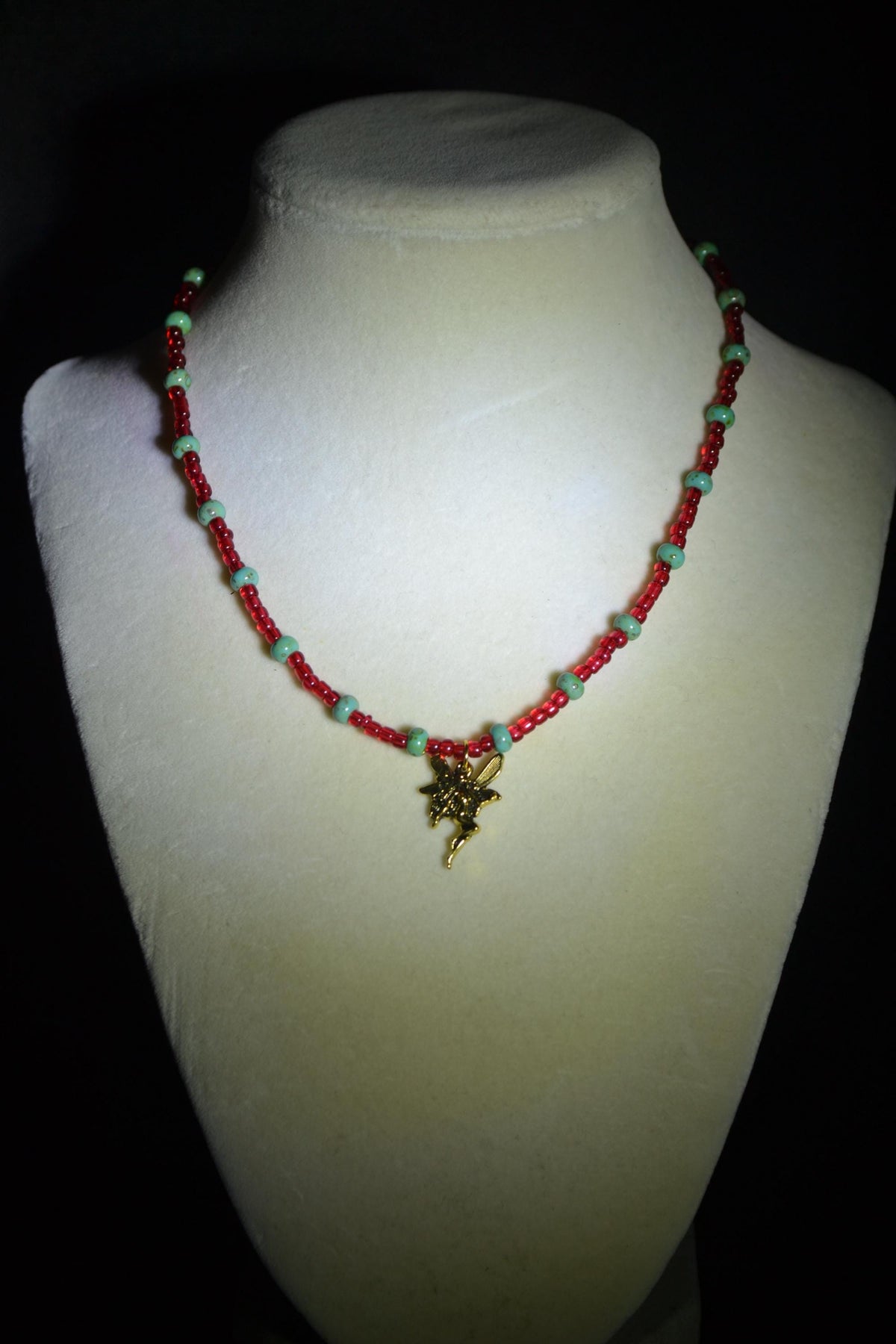 Gold fairy pendant glass bead choker. Red & Picasso turquoise