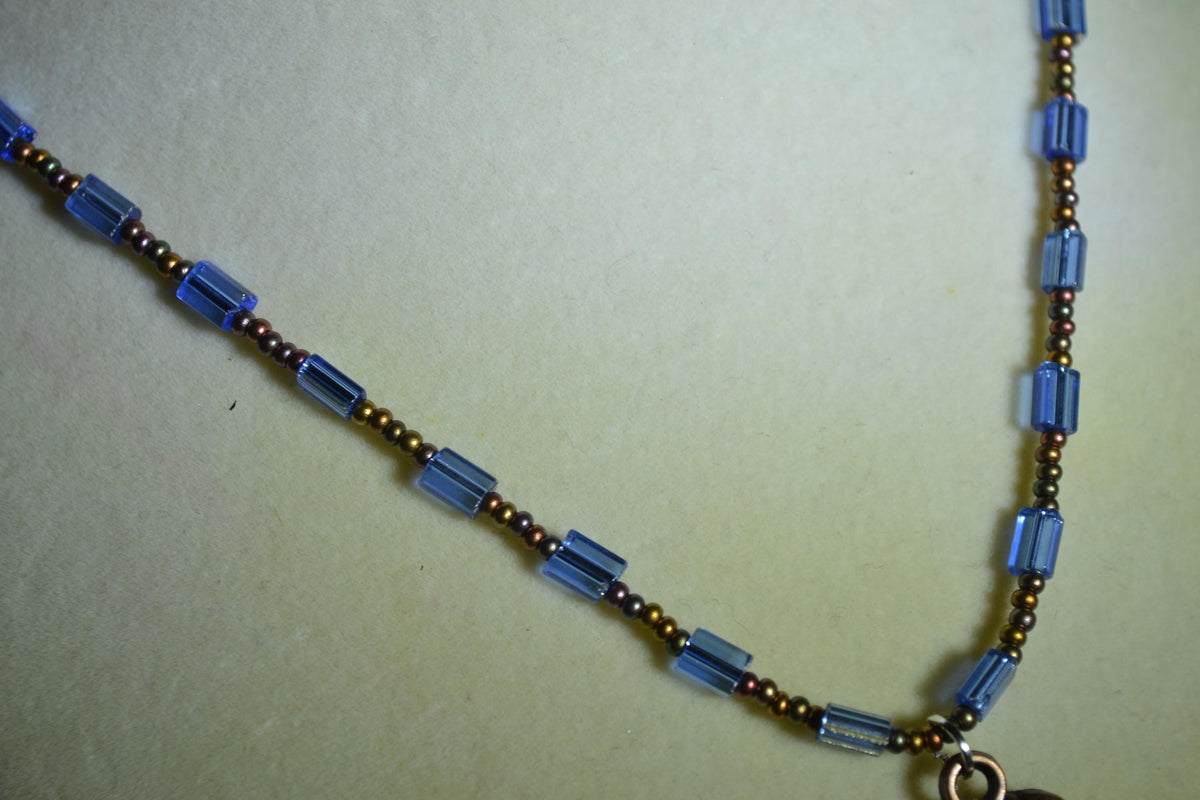 Bronze lobster pendant glass bead necklace. Mixed bronzes and blue