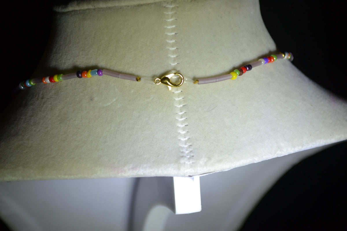 Blue planet pendant glass bead choker. Rainbow