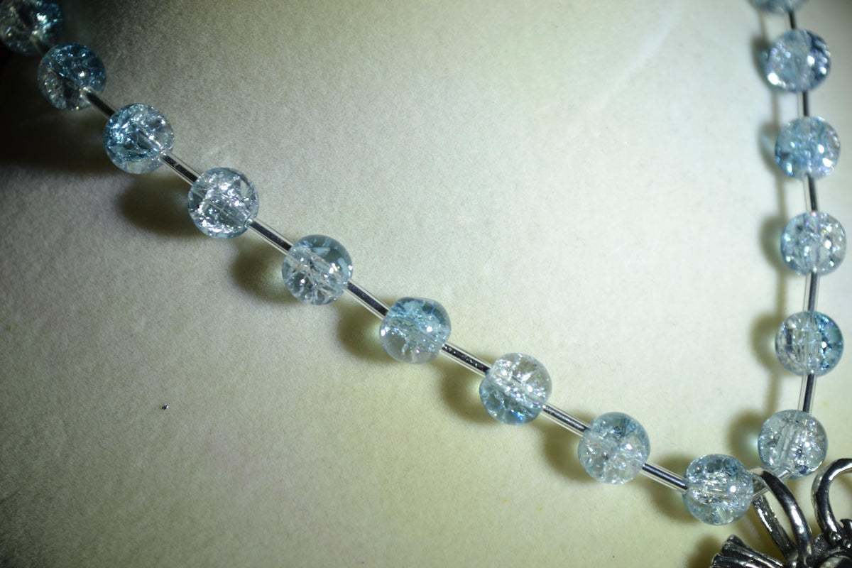 Silver anglerfish pendant glass bead choker. Crackled blue and silver