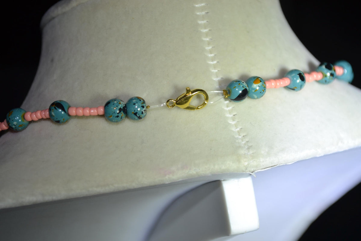 Multicolor glass bead necklace . Coral and turquoise