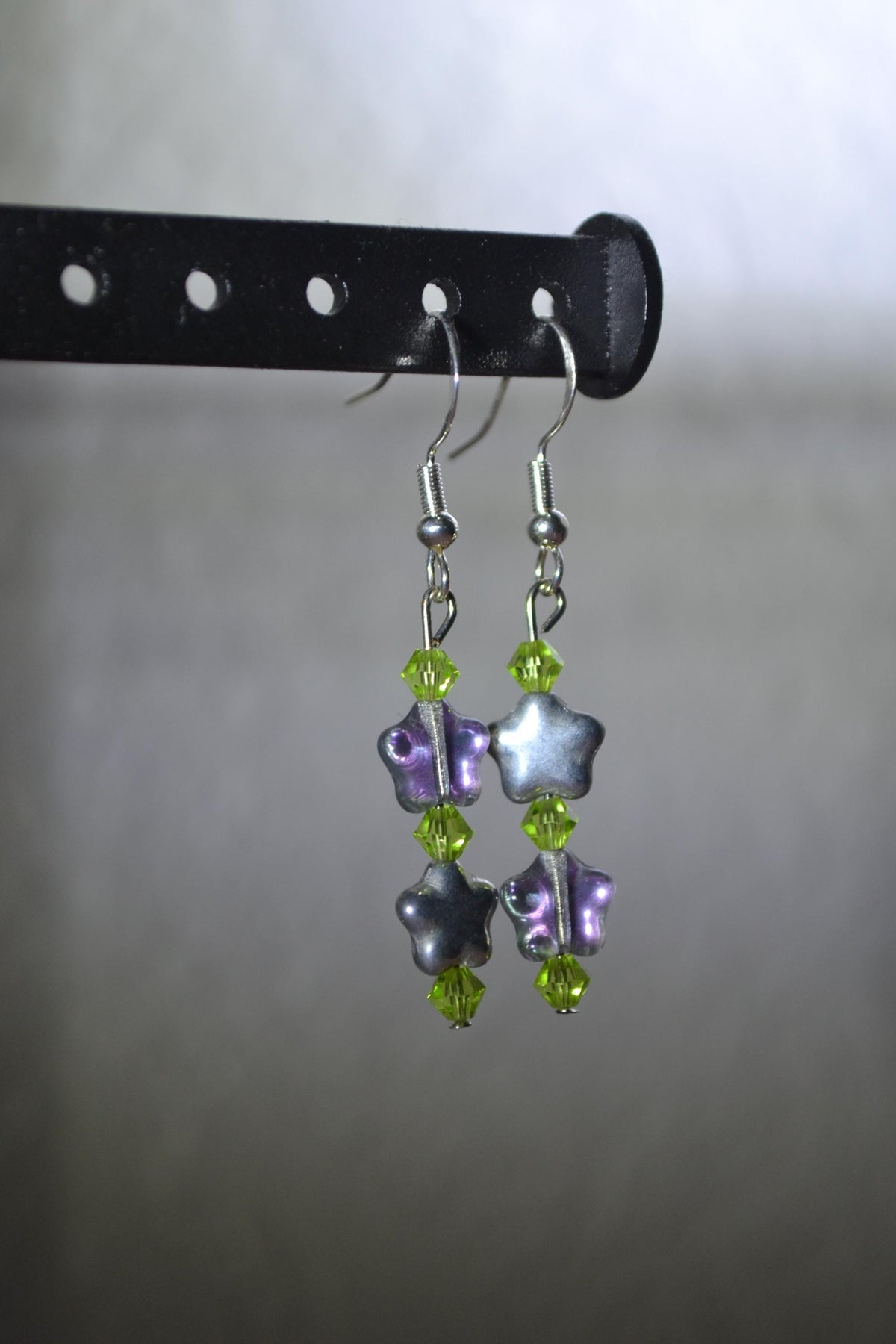 Beaded Star Earrings. Silver, iridescent purple, and jade