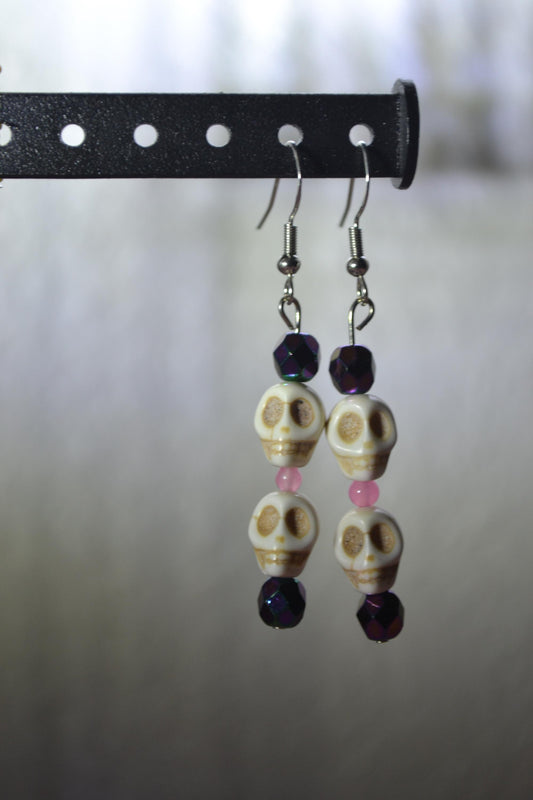 Beaded Skull Earrings. Metallic purple and pink