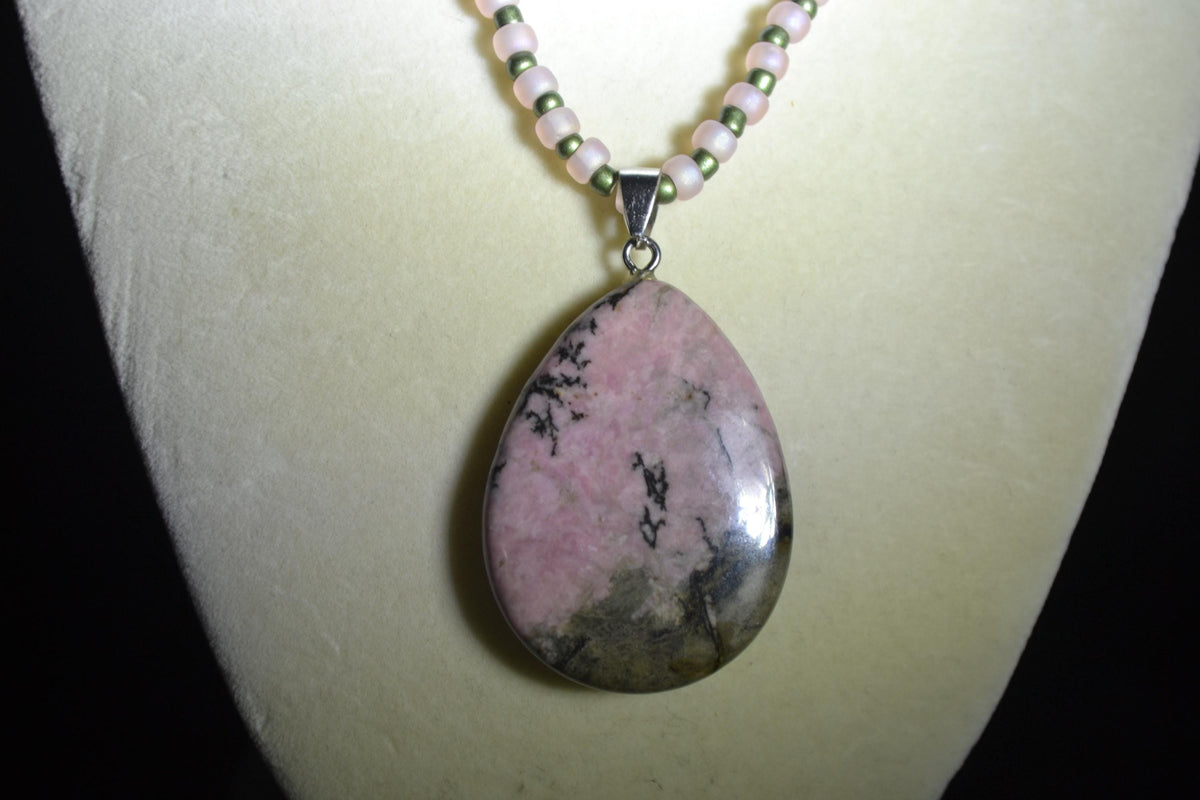 Rhodonite pendant glass bead necklace. Frosted pink & Metallic green