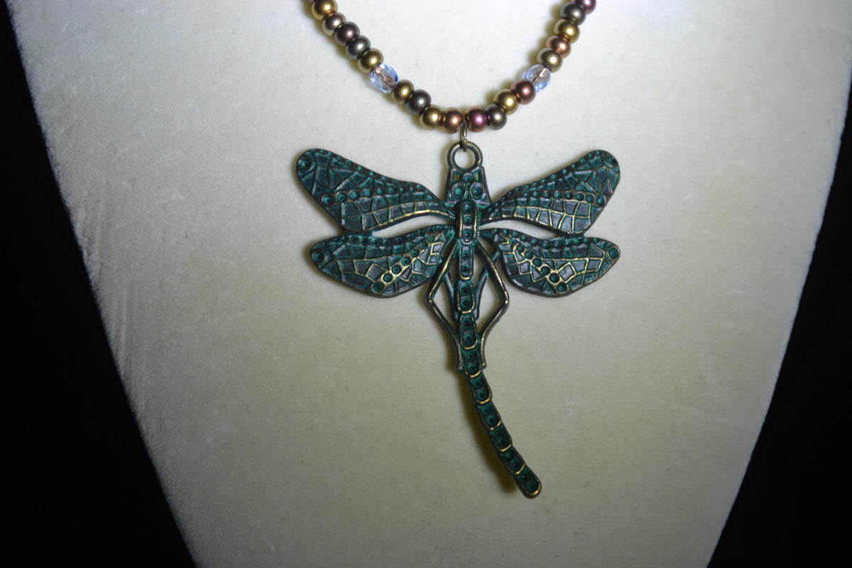 Bronze Dragonfly pendant glass bead necklace. Mixed bronzes and light blue