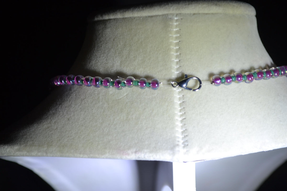 Silver starfish pendant glass bead necklace. Teal and iridescent pink