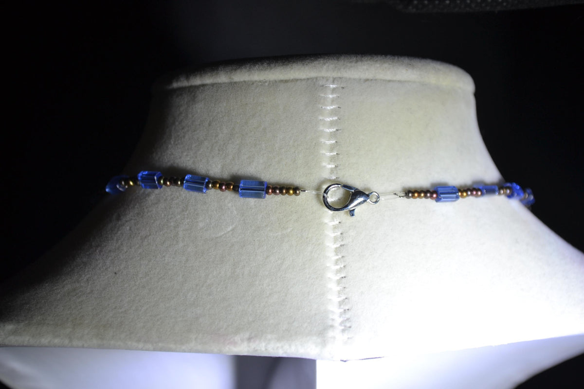 Bronze lobster pendant glass bead necklace. Mixed bronzes and blue