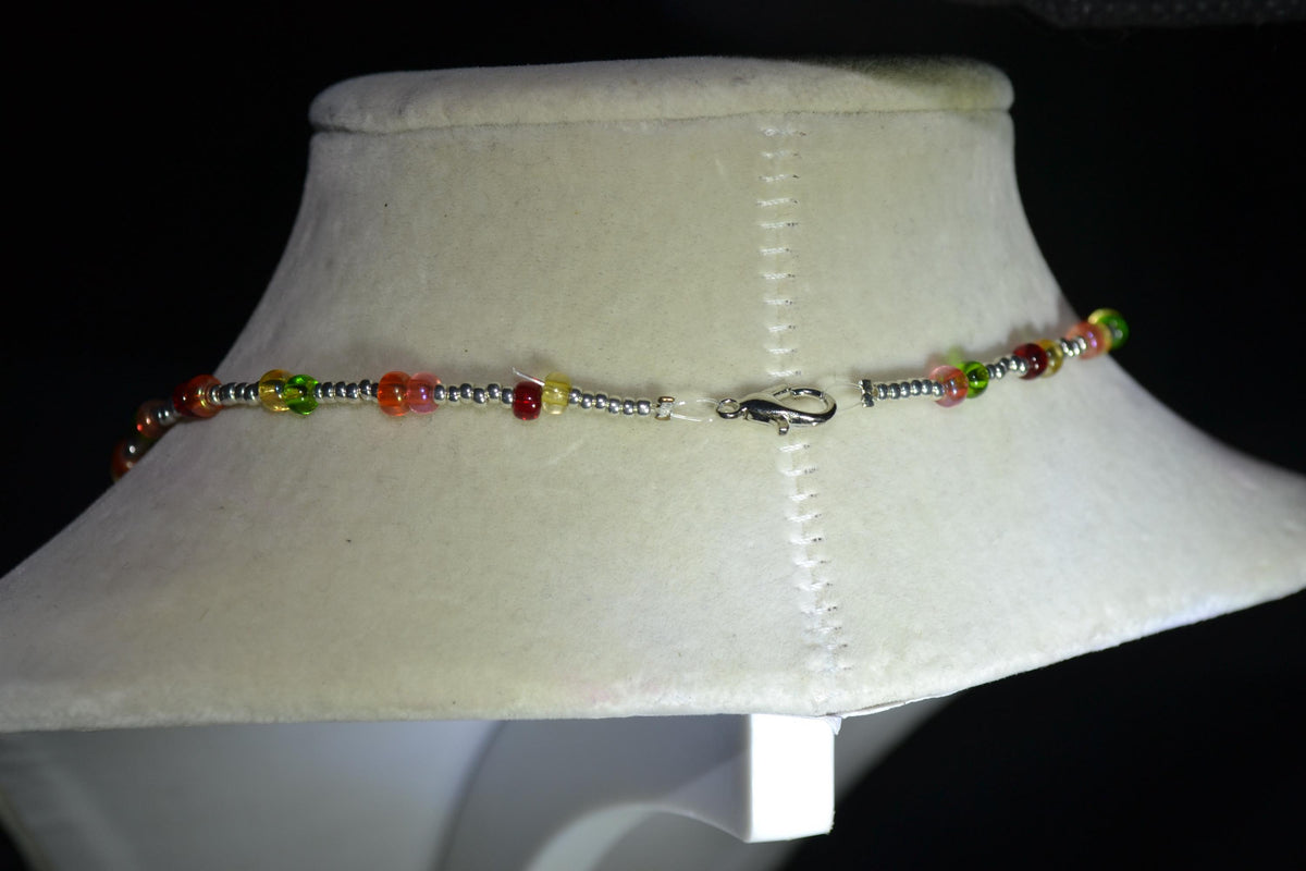 Silver Hummingbird pendant glass bead choker. Silver and skittles