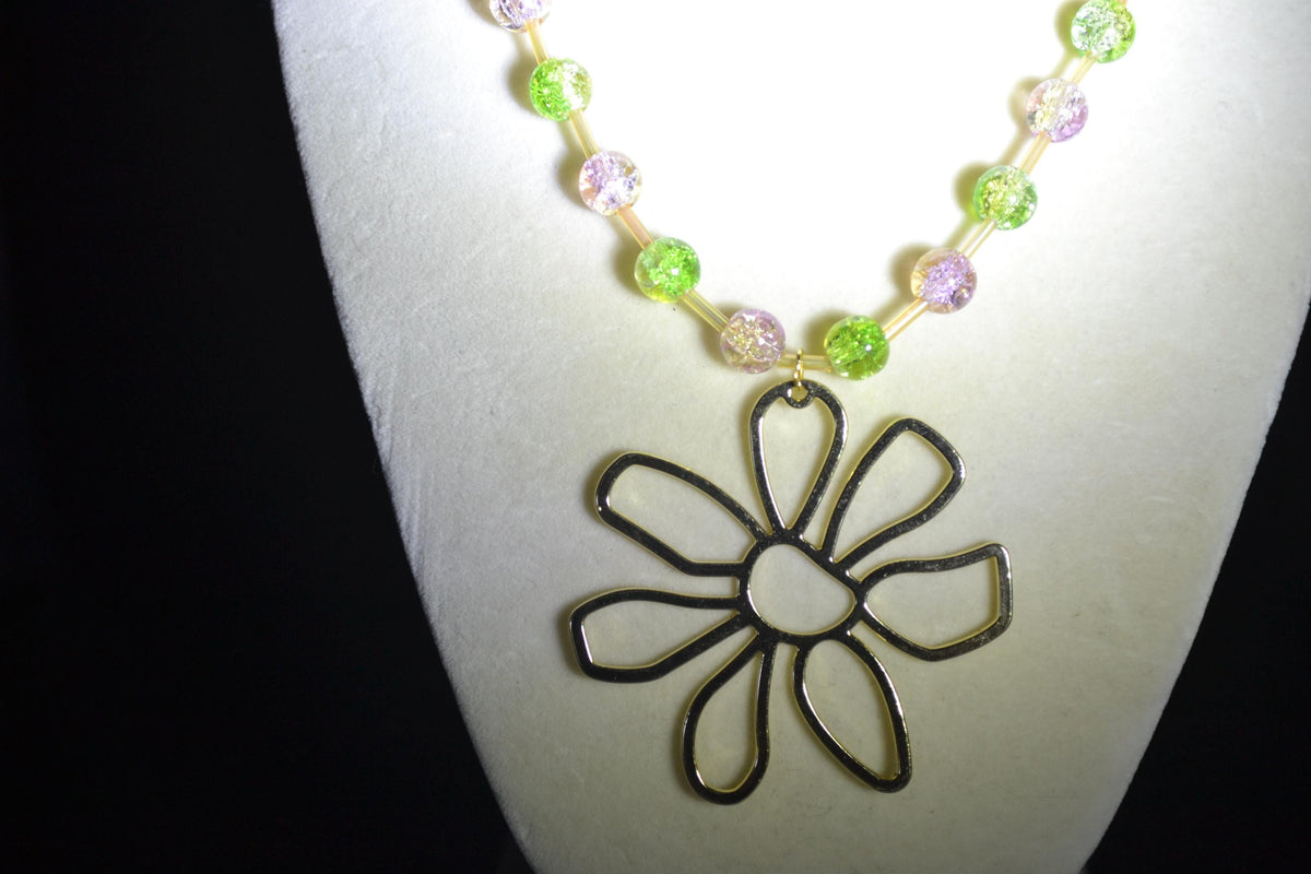 Gold Flower pendant glass bead necklace. Green, purple, and champagne