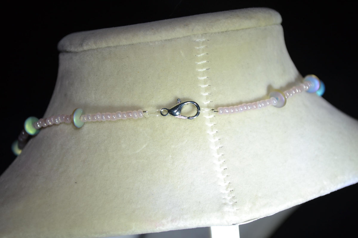 Silver Pelican pendant glass bead necklace. Pearl pink and sea glass