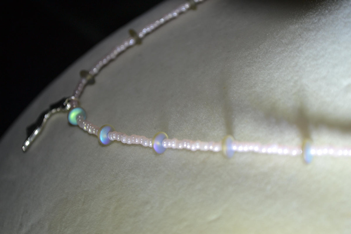 Silver Pelican pendant glass bead necklace. Pearl pink and sea glass