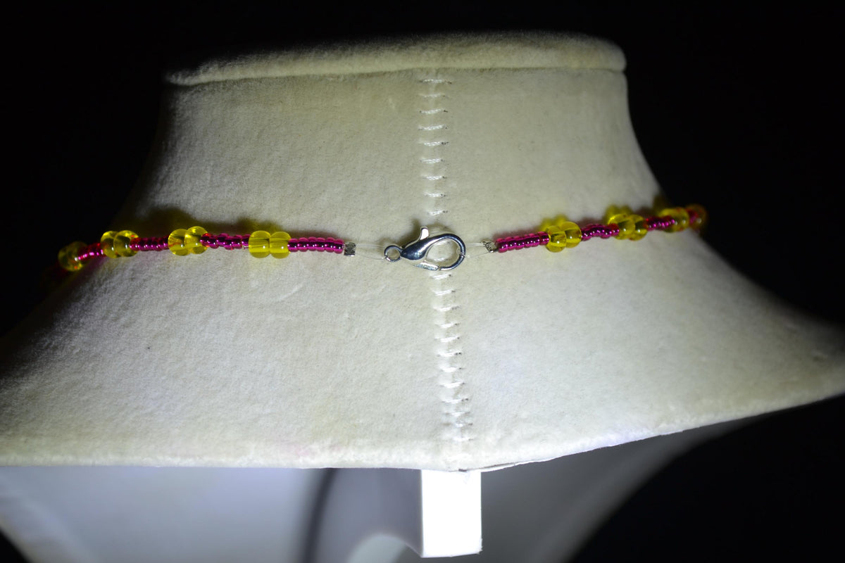 Silver Butterfly pendant glass bead necklace. Pink lemonade