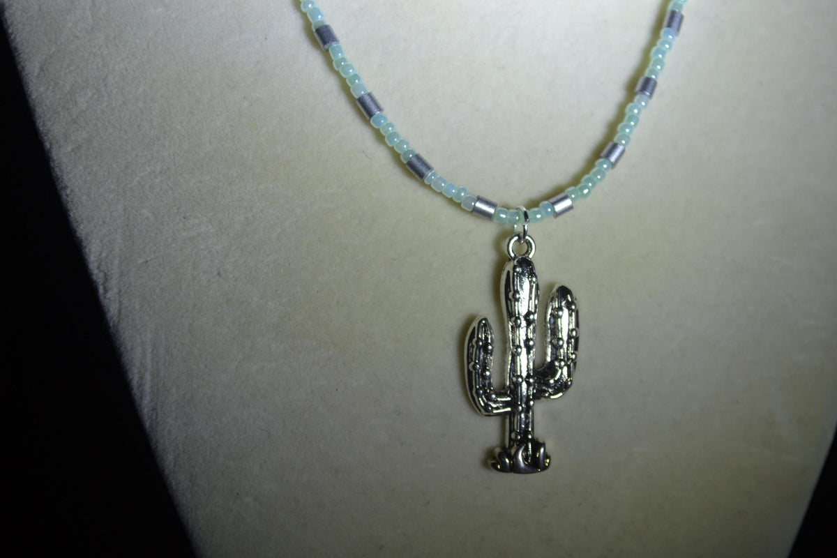 Silver Cactus pendant glass bead necklace. Pearl green and silver