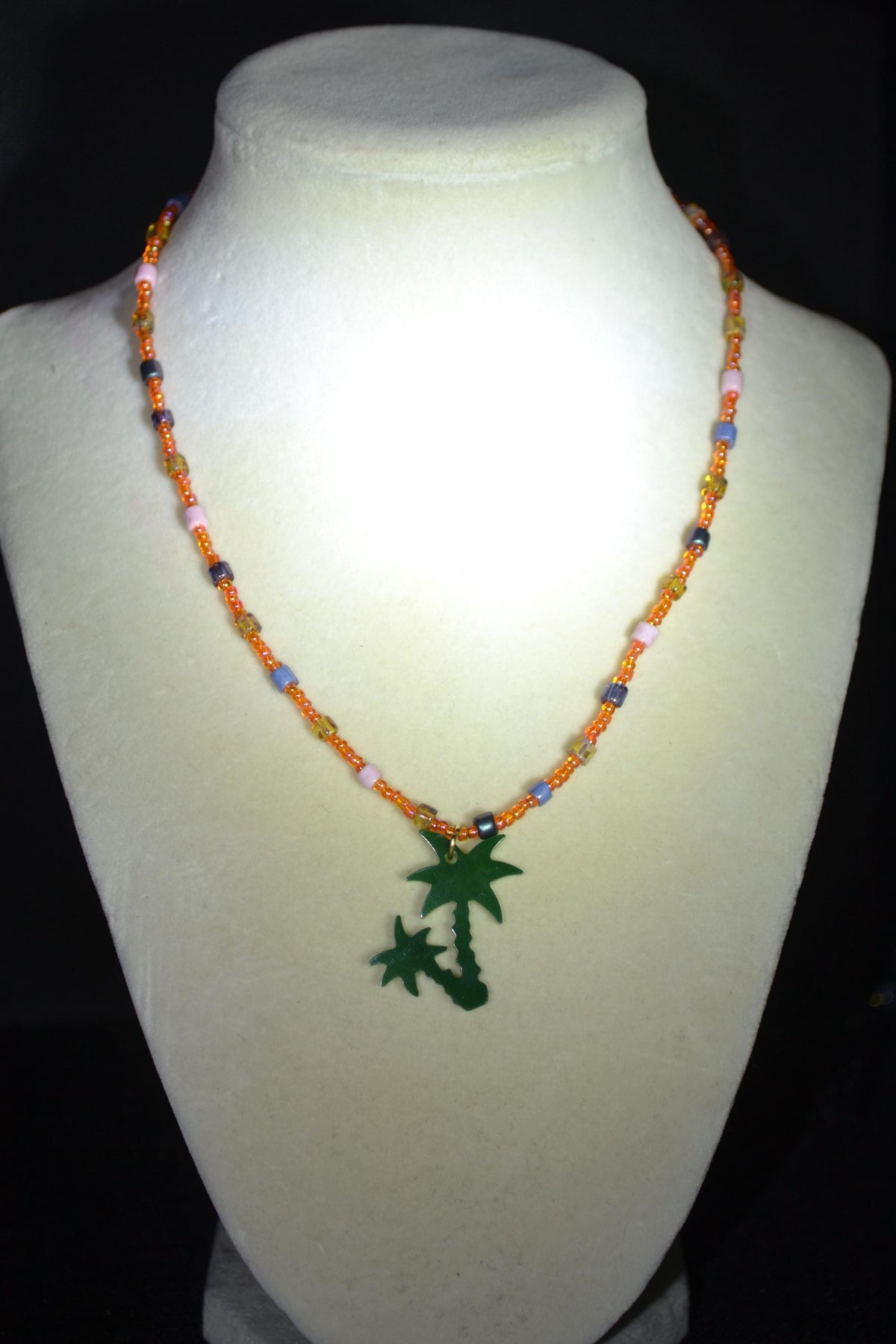 Green Palms pendant glass bead necklace. Orange and Picasso mix