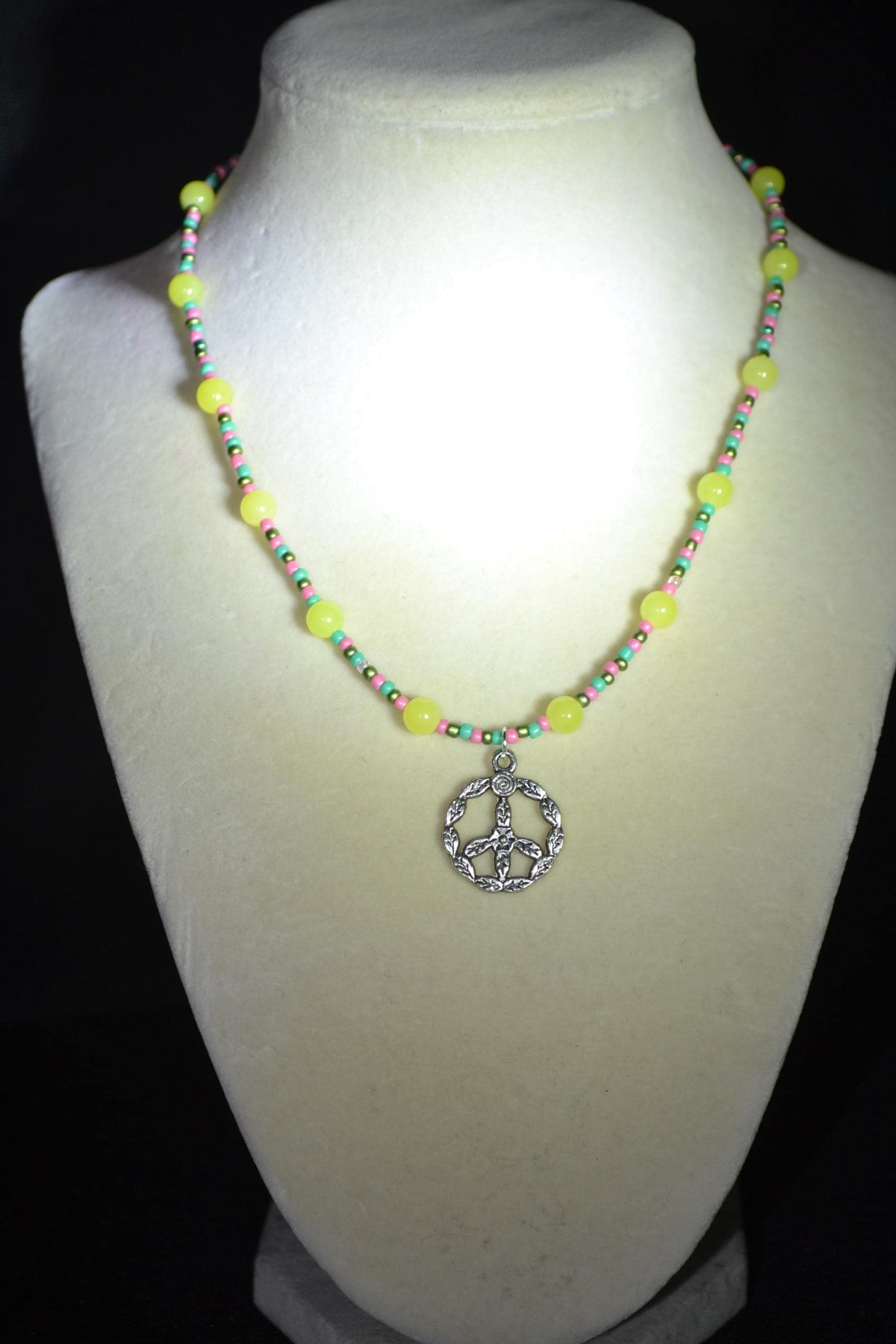 Silver Peace Sign pendant glass bead necklace. Yellow, teal, pink, and green