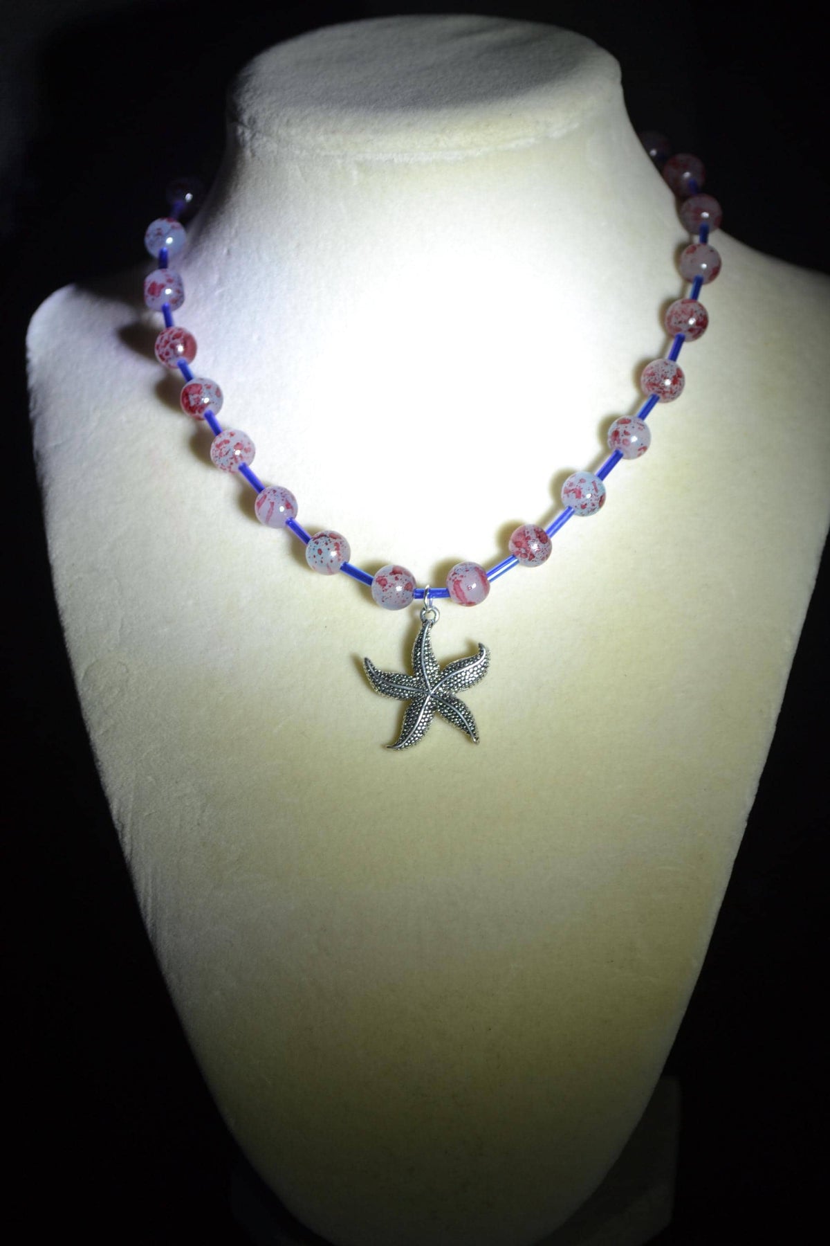 Silver Starfish pendant glass bead choker. Blue and red