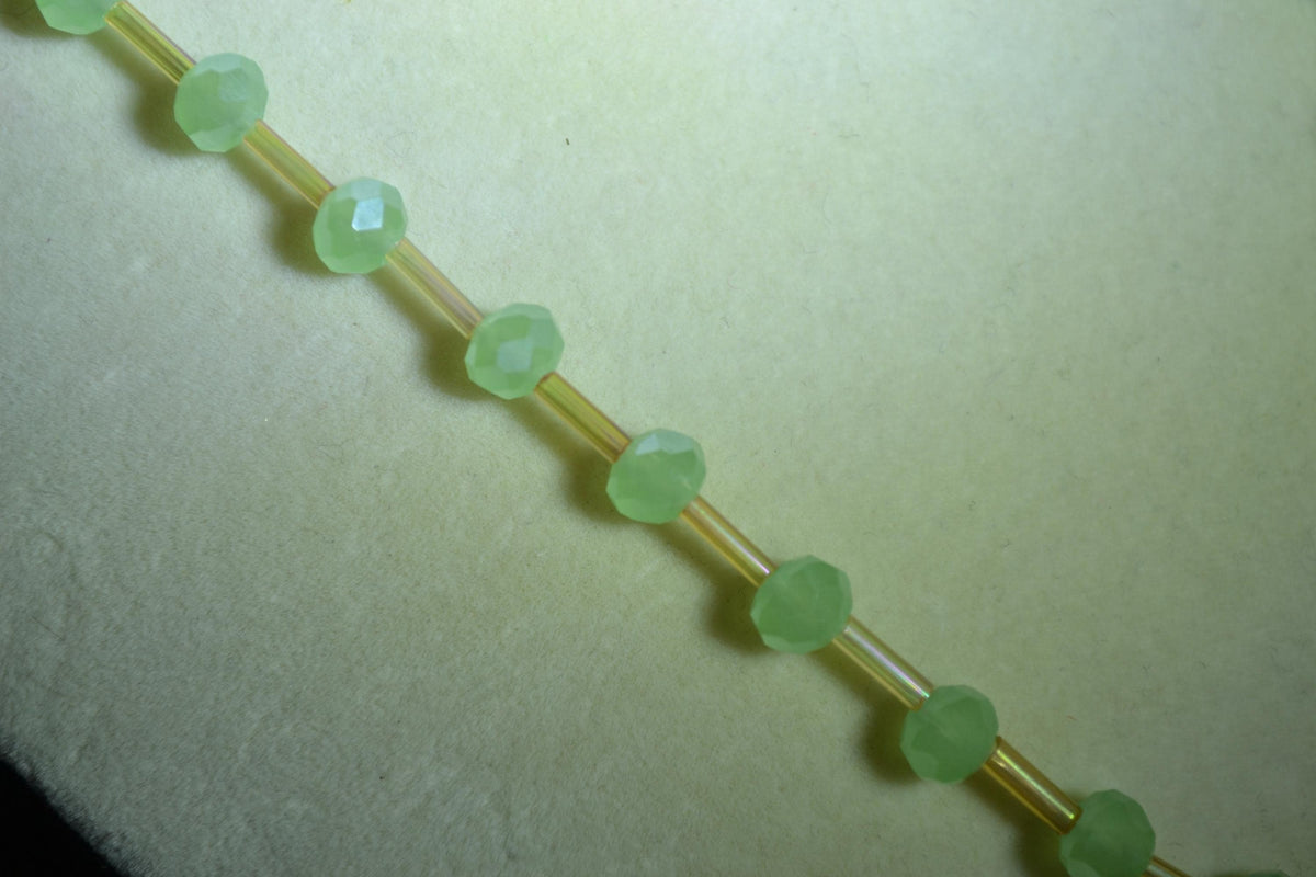 Bronze Dragonfly pendant glass bead necklace. Green and champagne