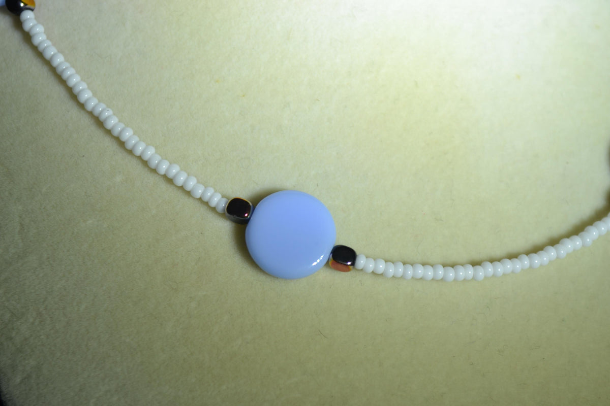 Multicolor glass bead necklace. Sky blue, metallic black, and white
