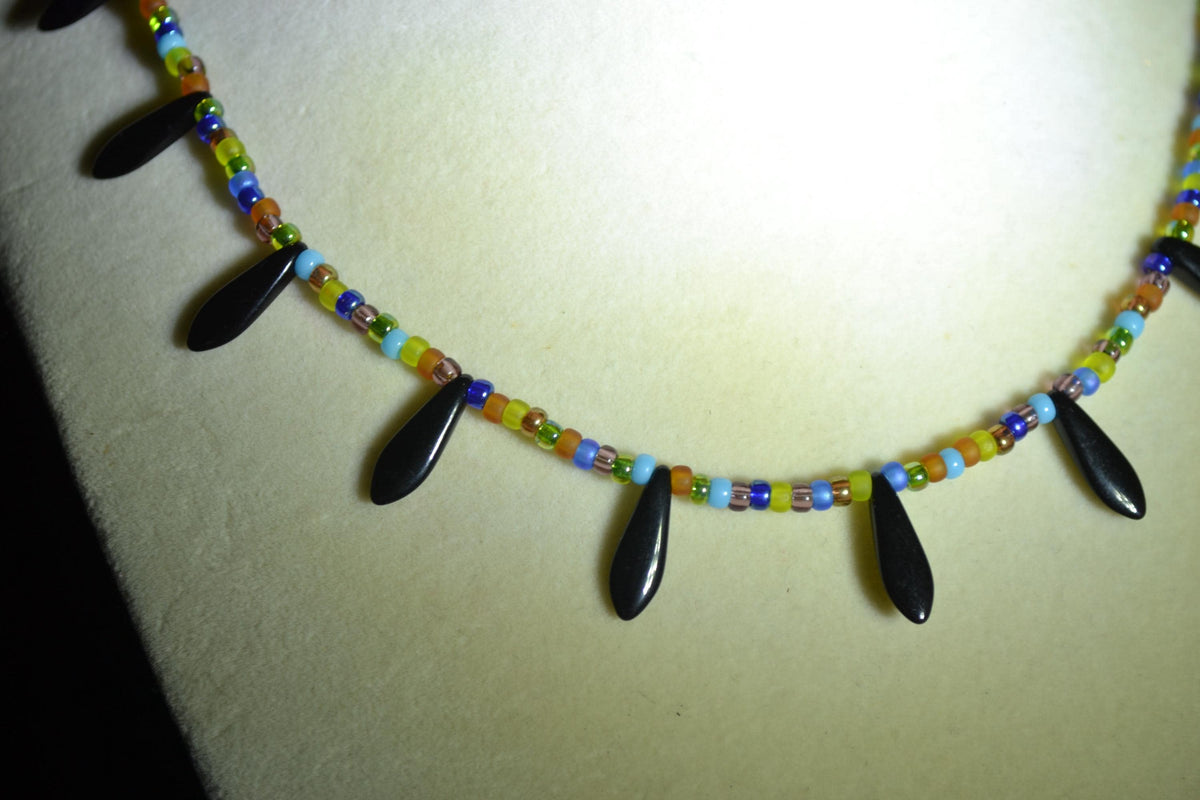 Multicolor glass bead choker. Black daggers and stained glass