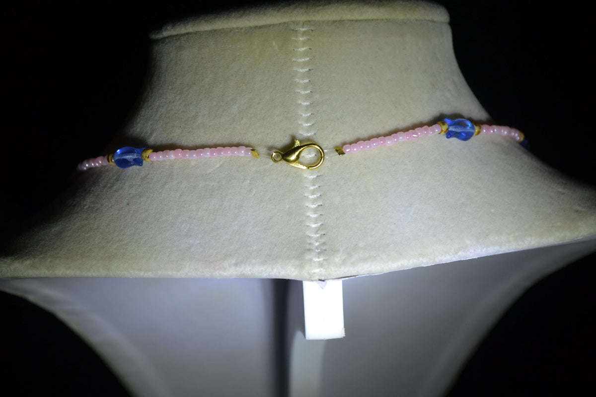 Beaded fish necklace. Pearl pink, iridescent blue, and Picasso