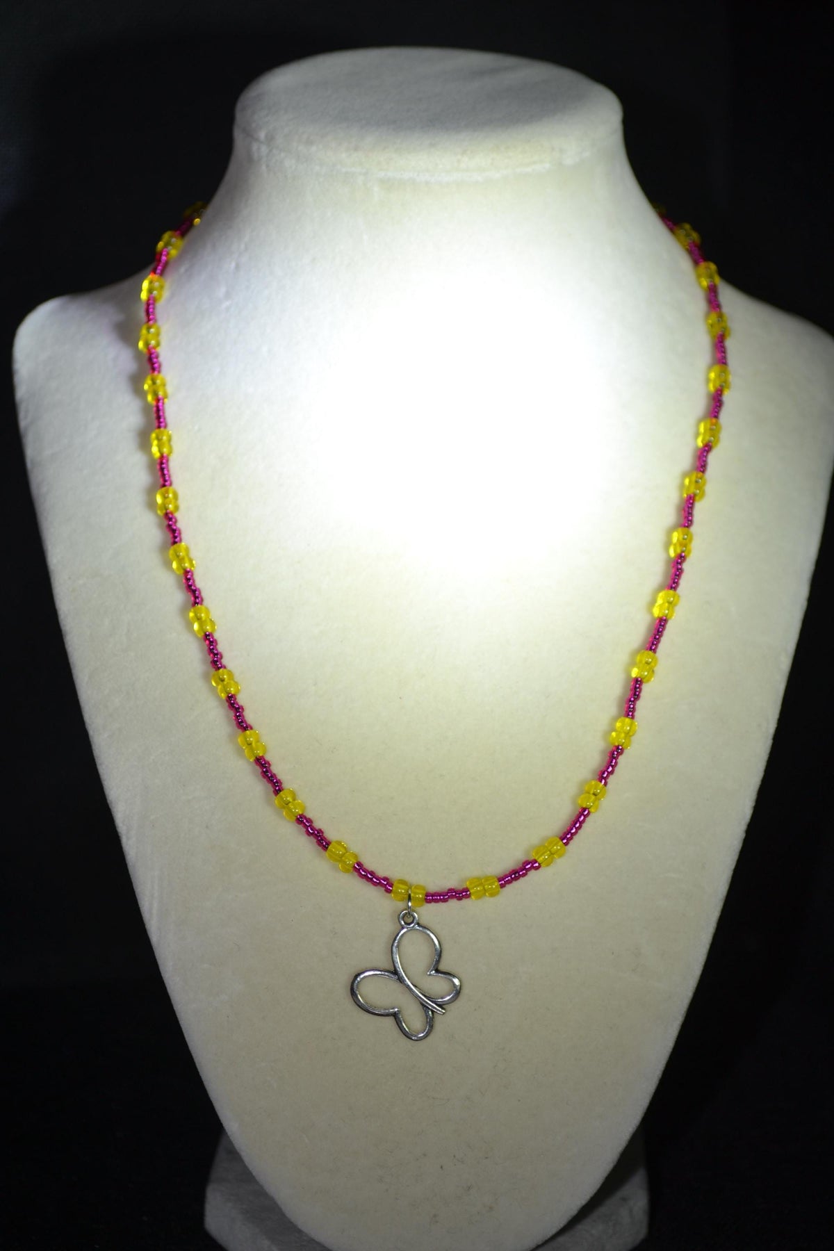 Silver Butterfly pendant glass bead necklace. Pink lemonade