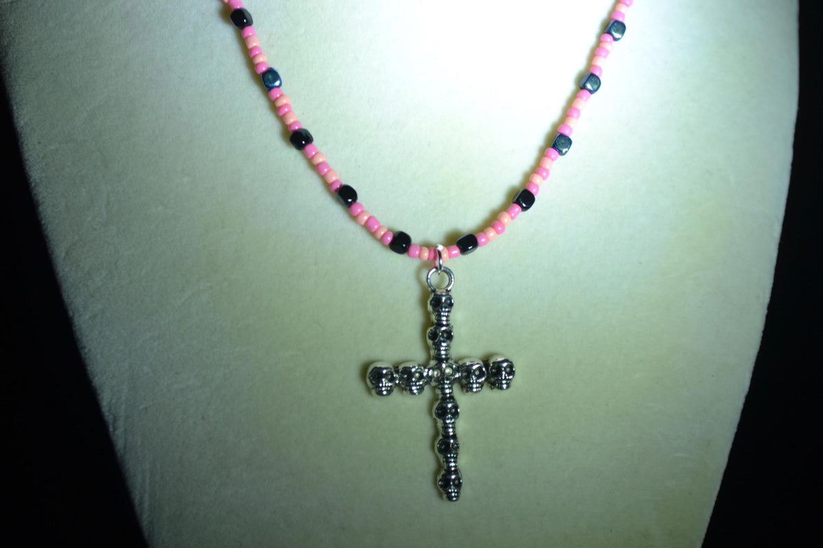 Silver Skull Cross pendant glass bead necklace. Coral, pink, and metallic black