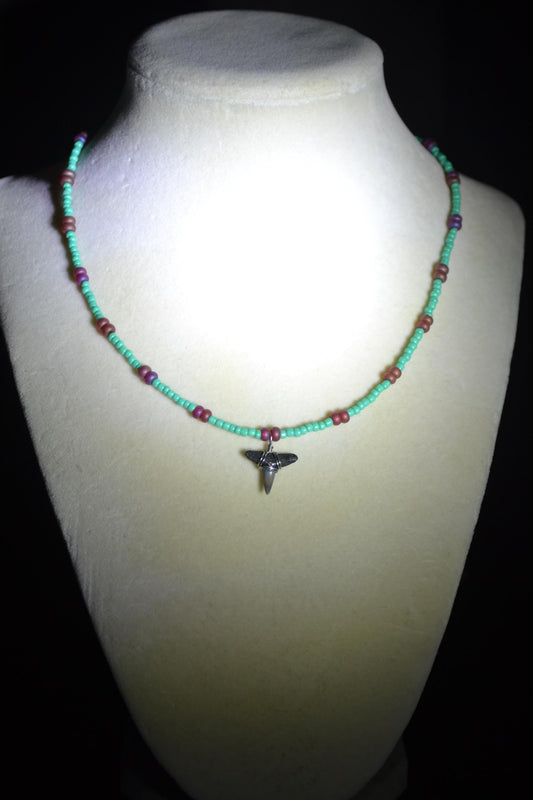 Wire wrapped sharks tooth beaded necklace. Teal and frosted red
